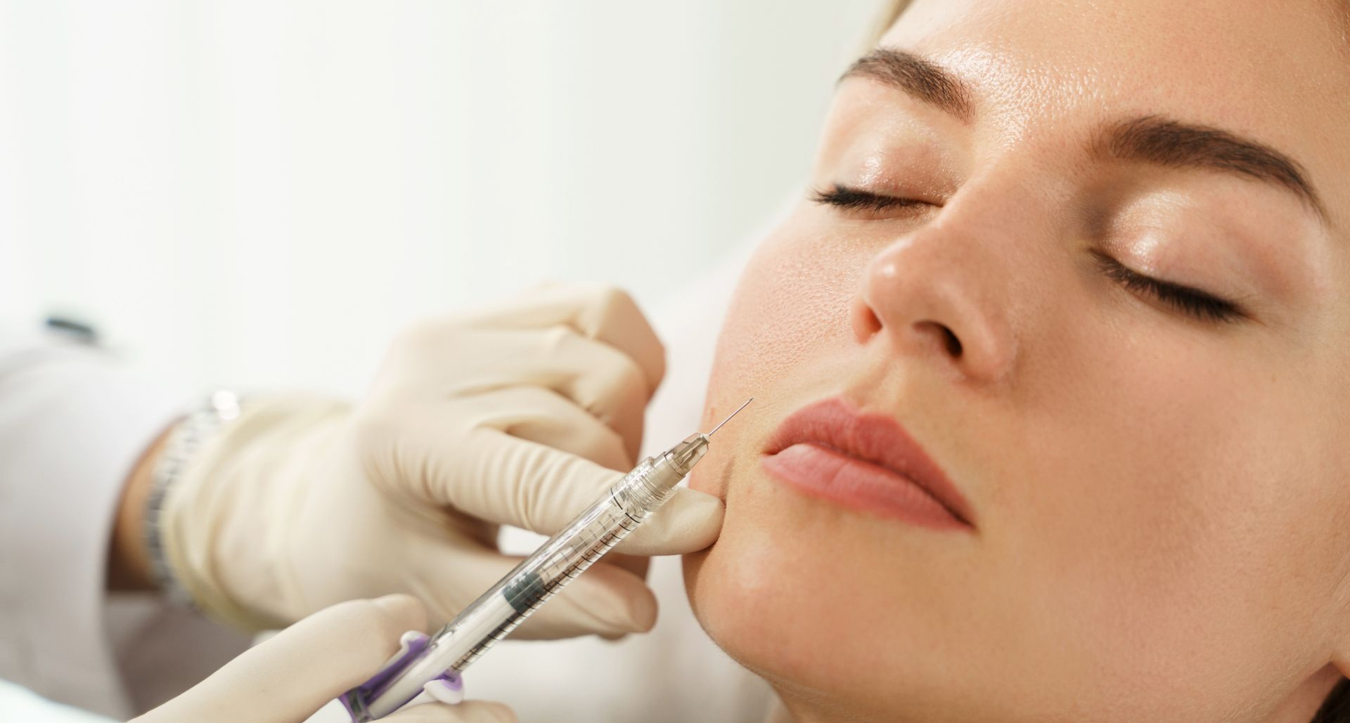 woman receiving her Facial Fat Graft treatment