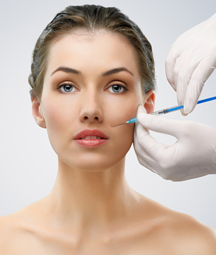 Woman getting facial botox