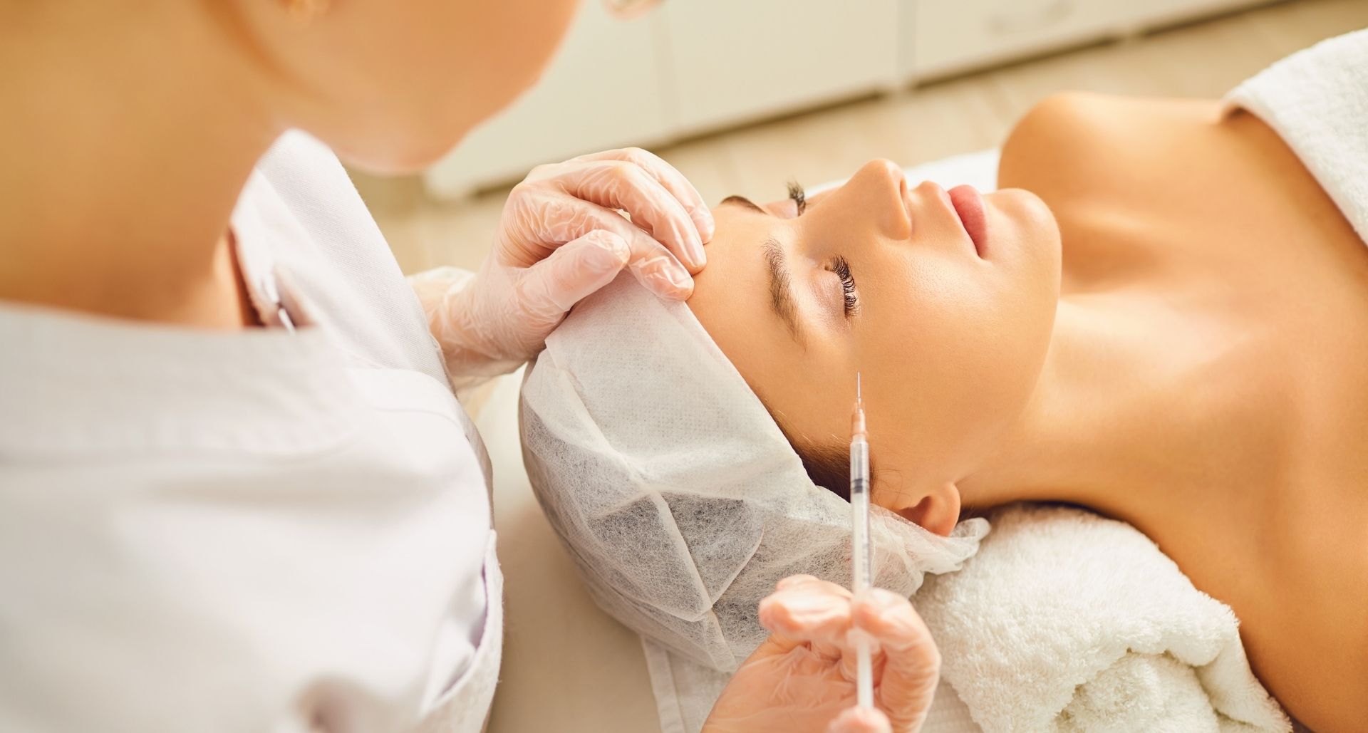 woman receiving botox for crow's feet wrinkles