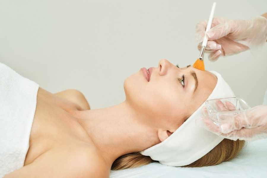 woman receiving chemical peel