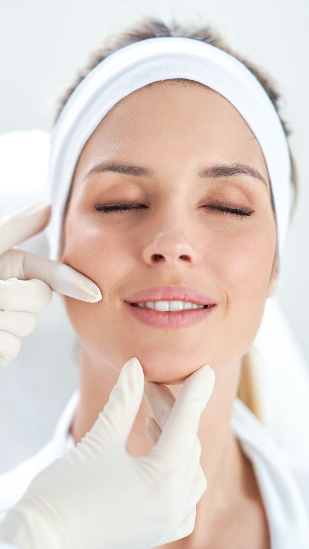 woman seeing the results of her face after her Facial Fat Grafting treatment